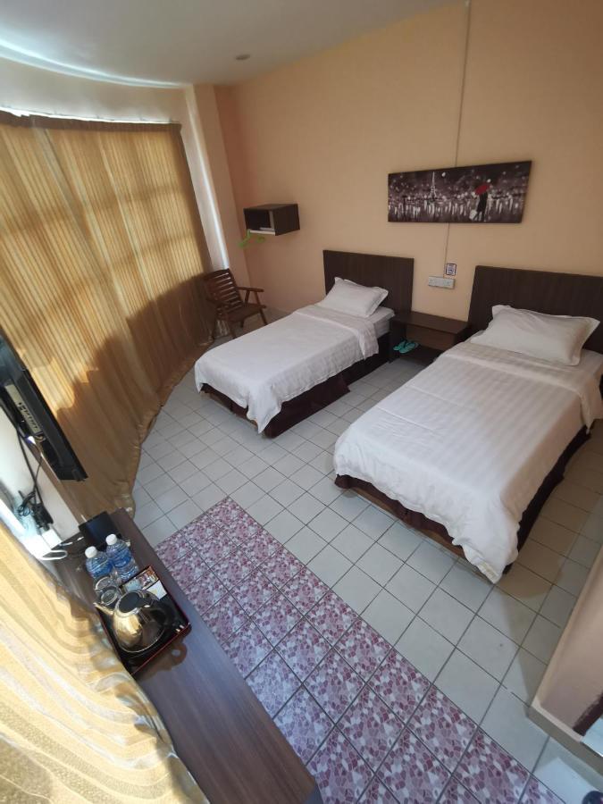 Indah Inn Тавау Экстерьер фото